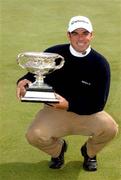 28 April 2002; Paul McGinley with the trophy after winning the Smurfit Irish PGA Championship, after the final round was abandoned due to bad weather, on day four of the Smurfit Irish PGA Championship at Westport Golf Club in Westport, Mayo. Photo by David Maher/Sportsfile