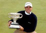 28 April 2002; Paul McGinley with the trophy after winning the Smurfit Irish PGA Championship, after the final round was abandoned due to bad weather, on day four of the Smurfit Irish PGA Championship at Westport Golf Club in Westport, Mayo. Photo by David Maher/Sportsfile