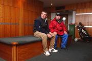 28 April 2002; Paul McGinley, left, eventual winner of the Smurfit Irish PGA Championship, sits in the locker room with his caddy Dean Gallagher while play was suspended and eventually abandoned on day four of the Smurfit Irish PGA Championship at Westport Golf Club in Westport, Mayo. Photo by David Maher/Sportsfile