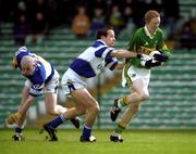 28 April 2002; Colm Cooper of Kerry goes past the challenge of Laois defenders Tom Kelly and Pauraic Leonard, left, on his way to scoring his side's first goal during the Allianz National Football League Division 2 Final match between Kerry and Laois at the Gaelic Grounds in Limerick. Photo by Brendan Moran/Sportsfile
