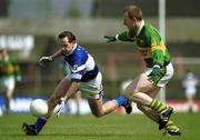 28 April 2002; Tom Kelly of Laois in action against Liam Hassett of Kerry during the Allianz National Football League Division 2 Final match between Kerry and Laois at the Gaelic Grounds in Limerick. Photo by Brendan Moran/Sportsfile