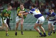 28 April 2002; Séamus Moynihan of Kerry is tackled by Ian Fitzgerald of Laois during the Allianz National Football League Division 2 Final match between Kerry and Laois at the Gaelic Grounds in Limerick. Photo by Brendan Moran/Sportsfile