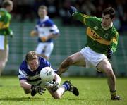 28 April 2002; Brian McDonald of Laois in action against Tom O'Sullivan of Kerry during the Allianz National Football League Division 2 Final match between Kerry and Laois at the Gaelic Grounds in Limerick. Photo by Brendan Moran/Sportsfile