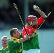 28 April 2002; Thomas Walsh of Carlow in action against Gay Kennedy of Meath during the Guinness Leinster Senior Hurling Championship First Round match between Carlow and Meath at Dr Cullen Park in Carlow. Photo by Ray McManus/Sportsfile