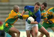 28 April 2002; Michael Murphy of Kerry, in action against Karl Lacey, left, and Ronan MacNiallais of Donegal during the All Ireland Intercounty Vocational Schools Football Final match between Donegal and Kerry at St Tiernach's Park in Clones, Monaghan. Photo by Damien Eagers/Sportsfile