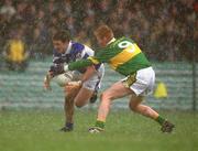 28 April 2002; Ian Fitzgerald of Laois in action against Seamus Scanlon of Kerry during the Allianz National Football League Division 2 Final match between Kerry and Laois at the Gaelic Grounds in Limerick. Photo by Brendan Moran/Sportsfile