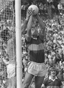 July 1982; John O'Keeffe of Kerry claims the ball ahead of his goalkeeper Charlie Nelligan during the Munster Senior Football Championship Final match between Cork and Kerry at Páirc Uí Chaoimh in Cork. Photo by Ray McManus/Sportsfile