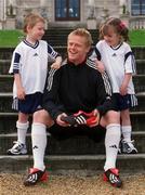 29 April 2002; Republic of Ireland International Damien Duff with 5 year olds Ciara O'Meara and Liam Scully, both from Swords, at the launch of The adidas Predator Mania football boot at The Radisson Hotel in Dublin. Photo by David Maher/Sportsfile