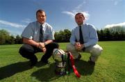 29 April 2002; Cork Constitution captain Ultan O'Callaghan, left, and Shannon captain David Quinlan and  pictured with the AIB League Division 1 trophy at a photocall ahead of the AIB All-Ireland League Division 1 final between Shannon and Cork Cork Constitution at Lansdowne Road on Saturday next. Photo by Brendan Moran/Sportsfile