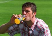 30 April 2002; Republic of Ireland International Niall Quinn at Lansdowne Road when a consignment of Lucozade Sport stocks was dispatched to Japan and Korea in time for the 2002 FIFA World Cup. Photo by Ray McManus/Sportsfile