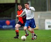 20 April 2002; John Cousins of Cheeverstown in action against Joe Doran of Kare during the Special Olympics Ireland / eircom National Cup Final match between Cheeverstown and Kare at Richmond Park in Dublin. Photo by Pat Murphy/Sportsfile