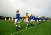 28 April 2002; Cavan captain Anthony Forde leads his team in the parade prior to the Allianz National Football League Division 1 Final match between Tyrone and Cavan at St Tiernach's Park in Clones, Monaghan. Photo by Damien Eagers/Sportsfile
