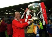 28 April 2002; Tyrone goalkeeper Peter Ward celebrates with the cup after the Allianz National Football League Division 1 Final match between Tyrone and Cavan at St Tiernach's Park in Clones, Monaghan. Photo by Damien Eagers/Sportsfile