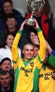 28 April 2002; Donegal captain Karl Lacey lifts the cup after the All Ireland Intercounty Vocational Schools Football Final match between Donegal and Kerry at St Tiernach's Park in Clones, Monaghan. Photo by Pat Murphy/Sportsfile