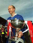 28 April 2002; Tyrone captain Peter Canavan, wearing a Cavan jersey, celebrates with the cup after the Allianz National Football League Division 1 Final match between Tyrone and Cavan at St Tiernach's Park in Clones, Monaghan. Photo by Damien Eagers/Sportsfile
