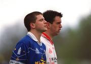 28 April 2002; Larry Reilly of Cavan and Brian Robinson of Tyrone stand for the playing of the National Anthem prior to the Allianz National Football League Division 1 Final match between Tyrone and Cavan at St Tiernach's Park in Clones, Monaghan. Photo by Pat Murphy/Sportsfile