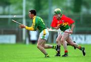 28 April 2002; David Callaghan of Meath in action against Paddy Coady of Carlow during the Guinness Leinster Senior Hurling Championship First Round match between Carlow and Meath at Dr Cullen Park in Carlow. Photo by Ray McManus/Sportsfile