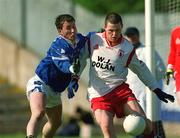 28 April 2002; Conor Gormley of Tyrone in action against Eddie Reilly of Cavan during the Allianz National Football League Division 1 Final match between Tyrone and Cavan at St Tiernach's Park in Clones, Monaghan. Photo by Damien Eagers/Sportsfile