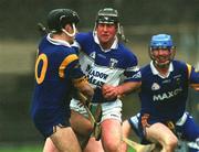 27 April 2002; David Cuddy of Laois in action against Timmy Collins of Wicklow during the Guinness Leinster Senior Hurling Championship First Round match between Wicklow and Laois at the County Grounds in Aughrim, Wicklow. Photo by Aoife Rice/Sportsfile