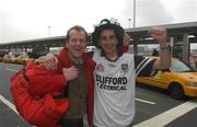 3 May 2002; Sligo supporters John Clifford and Thomas Carroll, right, both members of the St Mary's GAA Club, Sligo, on their arrival at JFK Airport, New York, prior to the Bank of Ireland Connacht Senior Foootball Championship match against New York on Sunday 5 May. Photo by Ray McManus/Sportsfile