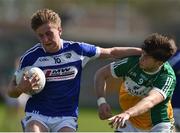 2 April 2017; Alan Farrell of Laois in action against Joseph O'Connor of Offaly during the Allianz Football League Division 3 Round 7 match between Offaly and Laois at O'Connor Park in Tullamore, Co Offaly. Photo by David Maher/Sportsfile