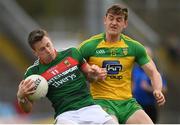 2 April 2017; Cillian O'Connor of Mayo in action against Hugh McFadden of Donegal during the Allianz Football League Division 1 Round 7 match between Mayo and Donegal at Elverys MacHale Park in Castlebar, Co Mayo. Photo by Stephen McCarthy/Sportsfile