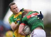 2 April 2017; Andy Moran of Mayo in action against Neil McGee of Donegal during the Allianz Football League Division 1 Round 7 match between Mayo and Donegal at Elverys MacHale Park in Castlebar, Co Mayo. Photo by Stephen McCarthy/Sportsfile