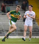 2 April 2017; Donnchadh Walsh of Kerry wheels away past David Mulgrew of Tyrone after scoring his team's final point during the Allianz Football League Division 1 Round 7 match between Kerry and Tyrone at Fitzgerald Stadium in Killarney, Co Kerry. Photo by Cody Glenn/Sportsfile