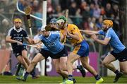 2 April 2017; Aaron Shanagher of Clare shoots to score his side's first goal despite the efforts of Liam Rushe, left, and Oisin Gough of Dublin during the Allianz Hurling League Division 1 Relegation Play-Off match between Clare and Dublin at Cusack Park in Ennis, Co Clare. Photo by Diarmuid Greene/Sportsfile