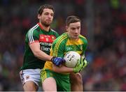 2 April 2017; Ciaran Thompson of Donegal in action against Tom Parsons of Mayo during the Allianz Football League Division 1 Round 7 match between Mayo and Donegal at Elverys MacHale Park in Castlebar, Co Mayo. Photo by Stephen McCarthy/Sportsfile