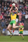 2 April 2017; Jason McGee of Donegal in action against Tom Parsons of Mayo during the Allianz Football League Division 1 Round 7 match between Mayo and Donegal at Elverys MacHale Park in Castlebar, Co Mayo. Photo by Stephen McCarthy/Sportsfile