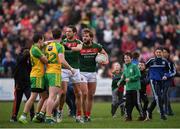 2 April 2017; Aidan O'Shea and Tom Parsons, left, of Mayo exchange views with Eóin McHugh, left, and Patrick McBrearty of Donegal as supporters come onto the pitch prior to the final whistle during the Allianz Football League Division 1 Round 7 match between Mayo and Donegal at Elverys MacHale Park in Castlebar, Co Mayo. Photo by Stephen McCarthy/Sportsfile