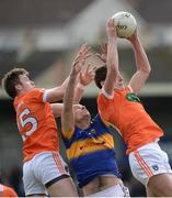 2 April 2017; Niall Grimley and Ciaron O'Hanlon of Armagh  in action against Alan Moloney of Tipperary  during the Allianz Football League Division 3 Round 7 match between Armagh and Tipperary at the Athletic Grounds in Armagh. Photo by Oliver McVeigh/Sportsfile
