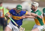 2 April 2017; John O'Dwyer of Tipperary in action against  Michael Cleary of Offaly during the Allianz Hurling League Division 1 Quarter-Final match between Offaly and Tipperary at O'Connor Park in Tullamore, Co Offaly. Photo by David Maher/Sportsfile