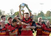 2 April 2017; Banbridge captain Johnny McKee celebrates with the trophy and team mates following his side's victory in the Irish Senior Men's Hockey Cup Final match between Banbridge and Monkstown at the National Hockey Stadium UCD in Belfield, Dublin. Photo by David Fitzgerald/Sportsfile