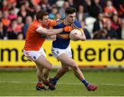 2 April 2017; Michael Quinlivan of Tipperary in action against Charlie Vernon of Armagh during the Allianz Football League Division 3 Round 7 match between Armagh and Tipperary at the Athletic Grounds in Armagh. Photo by Oliver McVeigh/Sportsfile