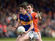 2 April 2017; Jack Kennedy of Tipperary in action against Niall Rowland of Armagh during the Allianz Football League Division 3 Round 7 match between Armagh and Tipperary at the Athletic Grounds in Armagh. Photo by Oliver McVeigh/Sportsfile