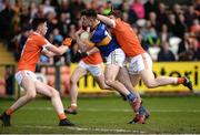 2 April 2017; Michael Quinlivan of Tipperary in action against Ben Crealey and Charlie Vernon of Armagh during the Allianz Football League Division 3 Round 7 match between Armagh and Tipperary at the Athletic Grounds in Armagh. Photo by Oliver McVeigh/Sportsfile