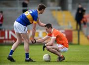 2 April 2017; Conor Sweeney of Tipperary commiserates Aaron McKay of Armagh after the final whistle in the Allianz Football League Division 3 Round 7 match between Armagh and Tipperary at the Athletic Grounds in Armagh. Photo by Oliver McVeigh/Sportsfile