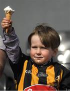 2 April 2017; Kilkenny supporter Tom Delaney, age 3, from Kilkenny City, holds up his ice cream cone during the Allianz Hurling League Division 1 Quarter-Final match between Kilkenny and Wexford at Nowlan Park in Kilkenny. Photo by Brendan Moran/Sportsfile