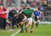 2 April 2017; Mike Casey of Limerick in action against Alan Cadogan of Cork during the Allianz Hurling League Division 1 Quarter-Final match between Cork and Limerick at Páirc Uí Rinn in Cork. Photo by Eóin Noonan/Sportsfile