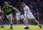 2 April 2017; Darren McCurry of Tyrone has a shot on goal under pressure from Mark Griffin of Kerry during the Allianz Football League Division 1 Round 7 match between Kerry and Tyrone at Fitzgerald Stadium in Killarney, Co Kerry. Photo by Cody Glenn/Sportsfile