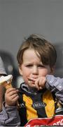 2 April 2017; Kilkenny supporter Tom Delaney, age 3, from Kilkenny City, eats an ice cream cone during the Allianz Hurling League Division 1 Quarter-Final match between Kilkenny and Wexford at Nowlan Park in Kilkenny. Photo by Brendan Moran/Sportsfile