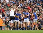 18 September 2011; Tipperary players and mentors celebrate after the game. GAA Football All-Ireland Minor Championship Final, Tipperary v Dublin, Croke Park, Dublin. Picture credit: Dáire Brennan / SPORTSFILE