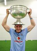 18 September 2011; Declan Lally, Dublin, celebrates with the Sam Maguire cup in the dressing room after the game. GAA Football All-Ireland Senior Championship Final, Kerry v Dublin, Croke Park, Dublin. Picture credit: Ray McManus / SPORTSFILE