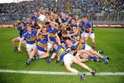 18 September 2011; The Tipperary team celebrates with the Tommy Markham Cup. GAA Football All-Ireland Minor Championship Final, Tipperary v Dublin, Croke Park, Dublin. Picture credit: Ray McManus / SPORTSFILE