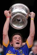 18 September 2011; Tipperary captain Liam McGrath lifts the Tommy Markam Cup. GAA Football All-Ireland Minor Championship Final, Tipperary v Dublin, Croke Park, Dublin. Picture credit: Stephen McCarthy / SPORTSFILE