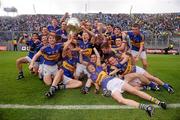 18 September 2011; Tipperary players celebrate with the Tommy Markam Cup. GAA Football All-Ireland Minor Championship Final, Tipperary v Dublin, Croke Park, Dublin. Picture credit: Stephen McCarthy / SPORTSFILE