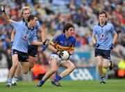 18 September 2011; Colin O'Riordan, Tipperary, in action against Cormac Costello, left, Patrick O'Higgins, centre, and Robert McDaid, right, Dublin. GAA Football All-Ireland Minor Championship Final, Tipperary v Dublin, Croke Park, Dublin. Picture credit: Barry Cregg / SPORTSFILE