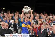 18 September 2011; Tipperary captain Liam McGrath lifts the Tommy Markham cup. GAA Football All-Ireland Minor Championship Final, Tipperary v Dublin, Croke Park, Dublin. Picture credit: David Maher / SPORTSFILE